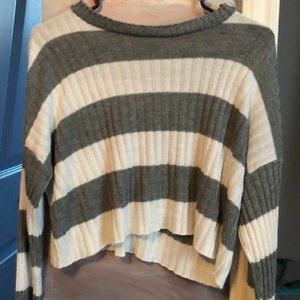 A gray & white knitted cropped sweater